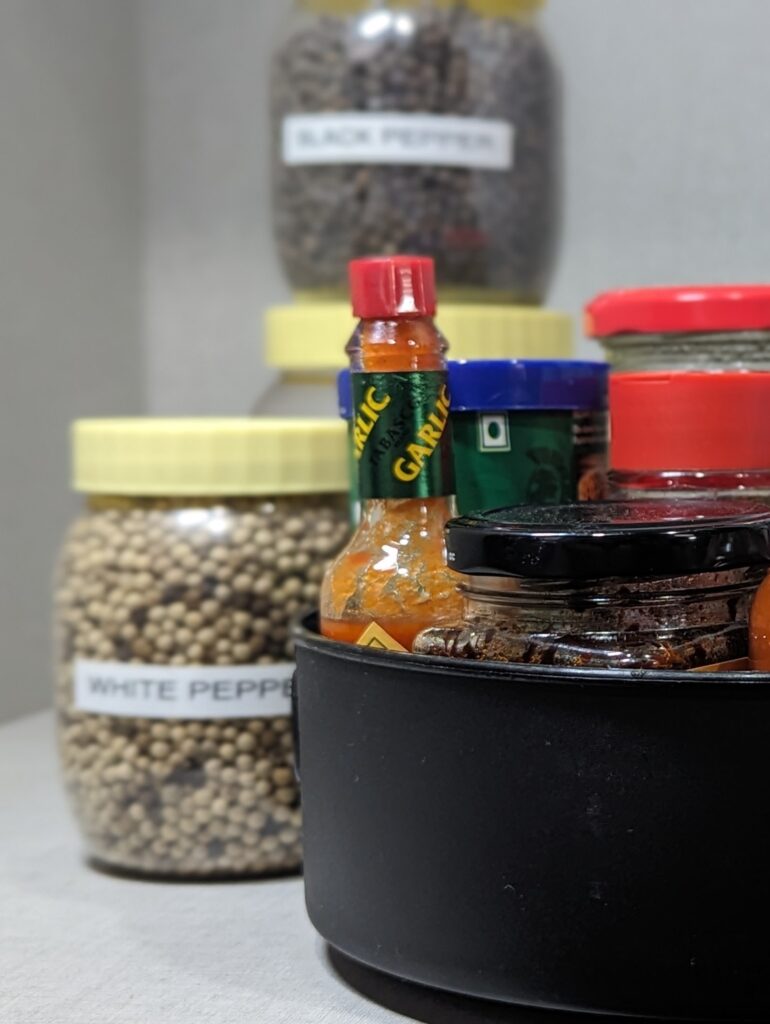 Sauces in lazy susan in pantry