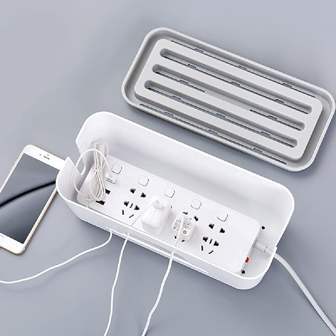 cables or cords organized in a hide away basket