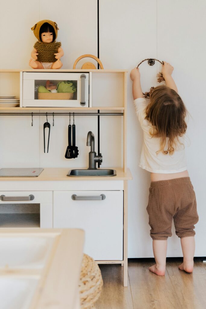Kids playroom kid hanging basket on the wall in a dummy kitchen